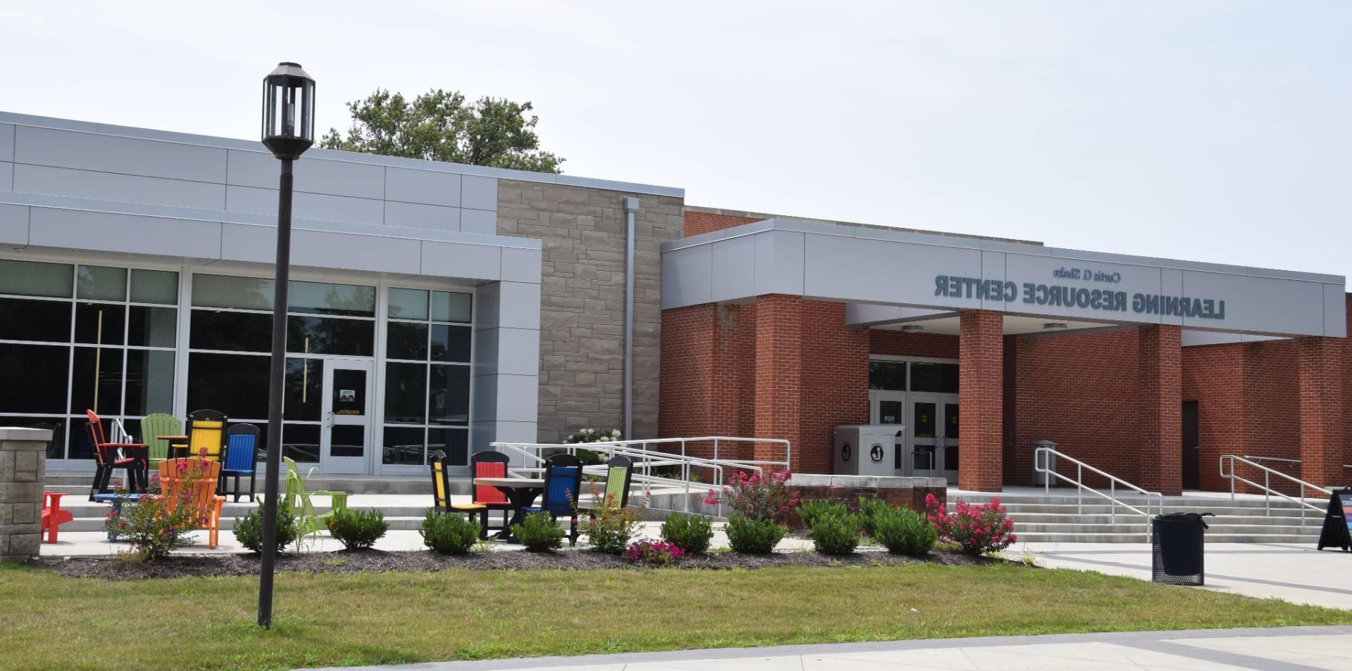 The front entrance of the Learning Resource center with the roses in bloom